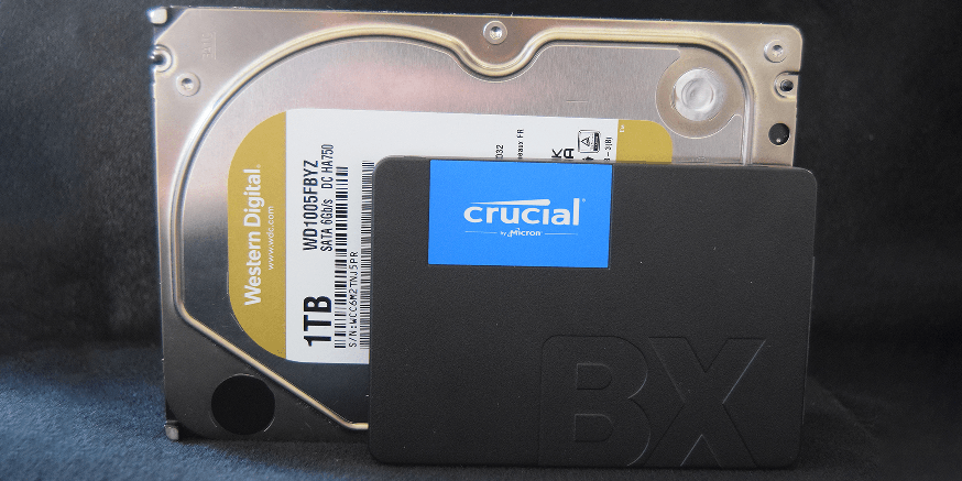a smaller Crucial SSD in front of a larger Western Digital HDD
